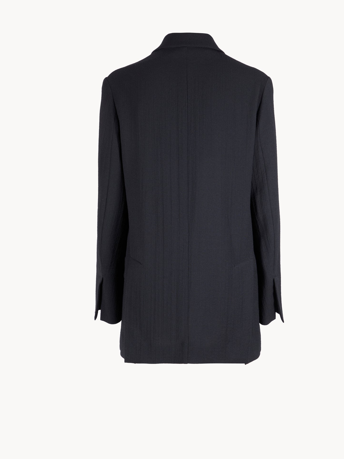 Cardigan jacket in washed wool crèpe.